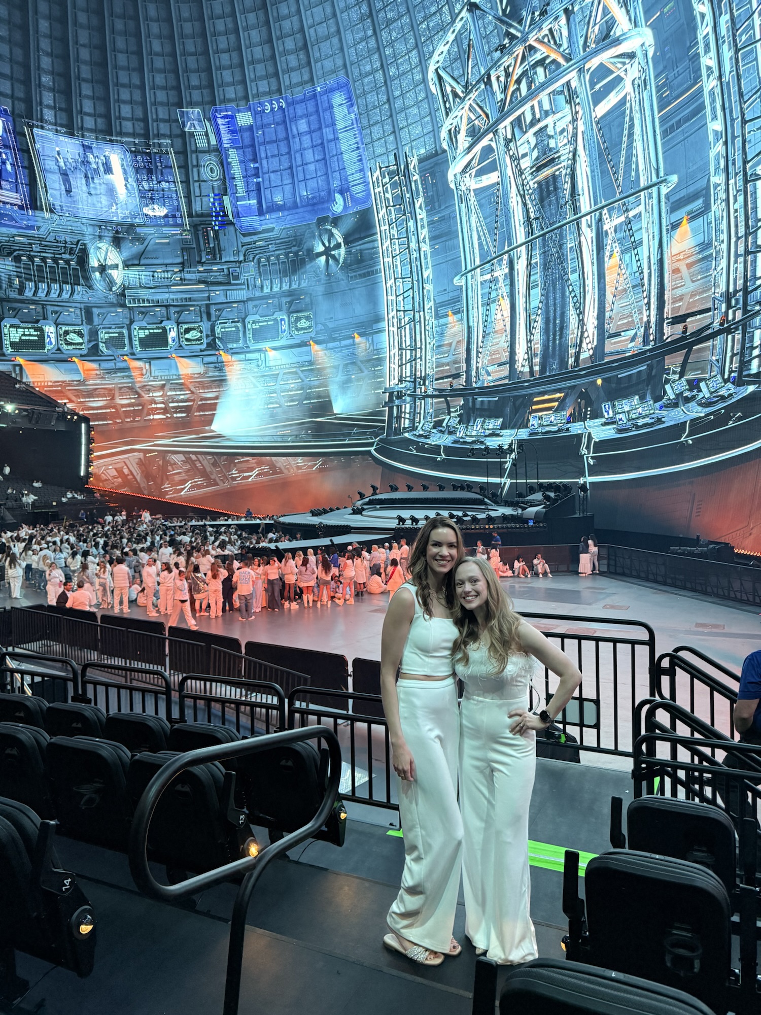 Two moms posing inside the Las Vegas Sphere before a Backstreet Boys concert during a girls trip to Vegas.