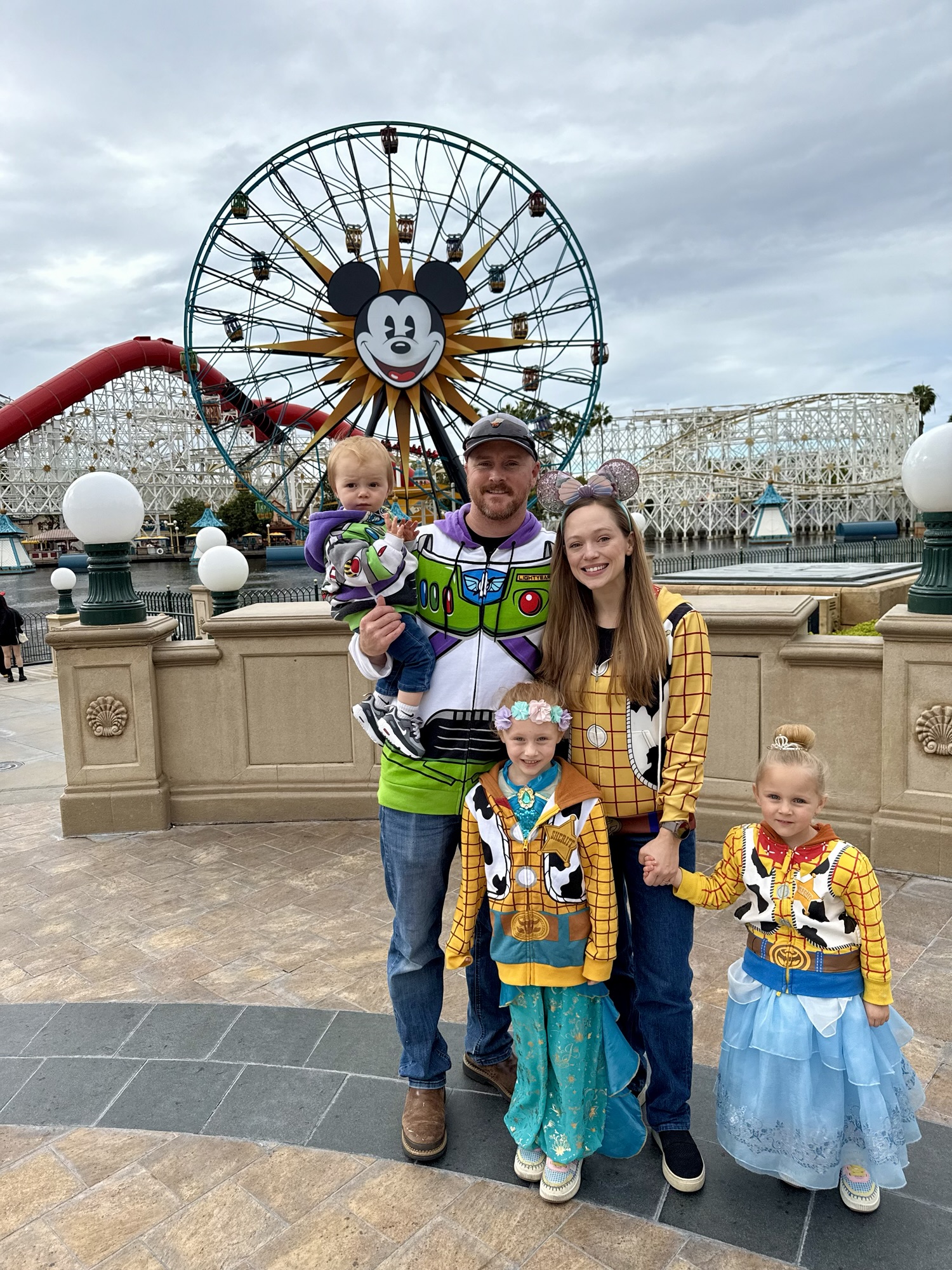 Family of five at Pixar Pier at Disney California Adventure during a Disneyland vacation.
